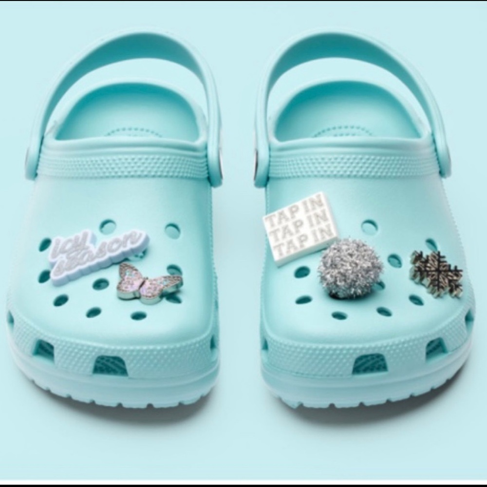 Brand new (M) sz5/(W) sz7 Icy Blue Saweetie collaboration Crocs with Jibbitz.